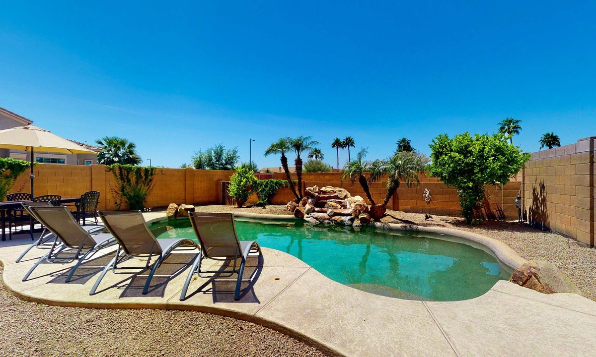 Palm Valley House | Airy home with private heated pool, firepit, grill, enclosed backyard, cornhole