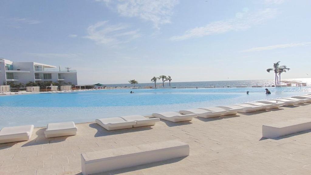 Flamingos Apartment | Amazing &Totally New! Aria Ocean Condo 306 by Kivoya