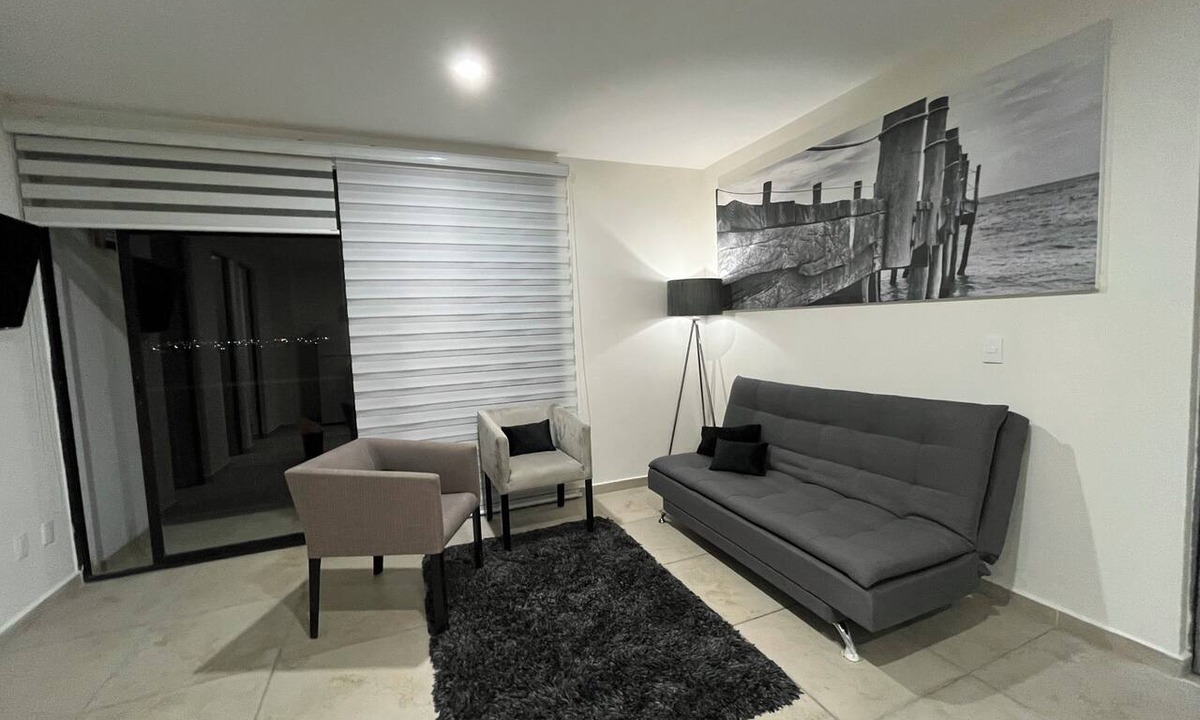 Zapopan Apartment | Apartment in Zapopan, Jalisco, with a view of the mountains and a pool