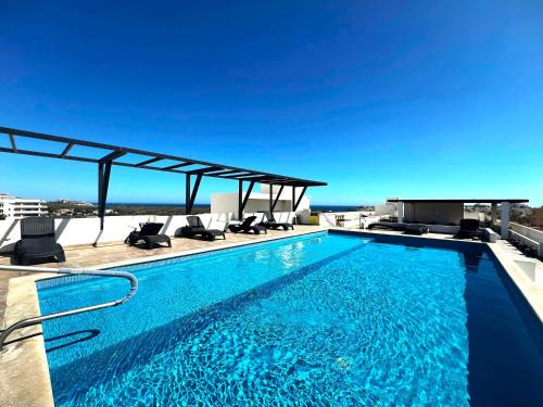 El Tezal Apartment | Bahia del Tezal 103b Modern 1BR Retreat with Rooftop Pool & Beach Access