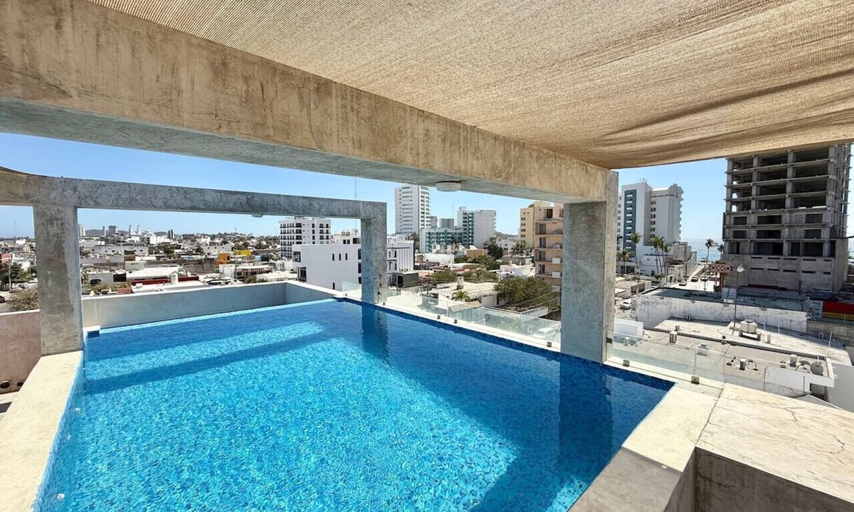 Ferrocarrilera Apartment | Beautiful Loft Steps from the Beach By GPS