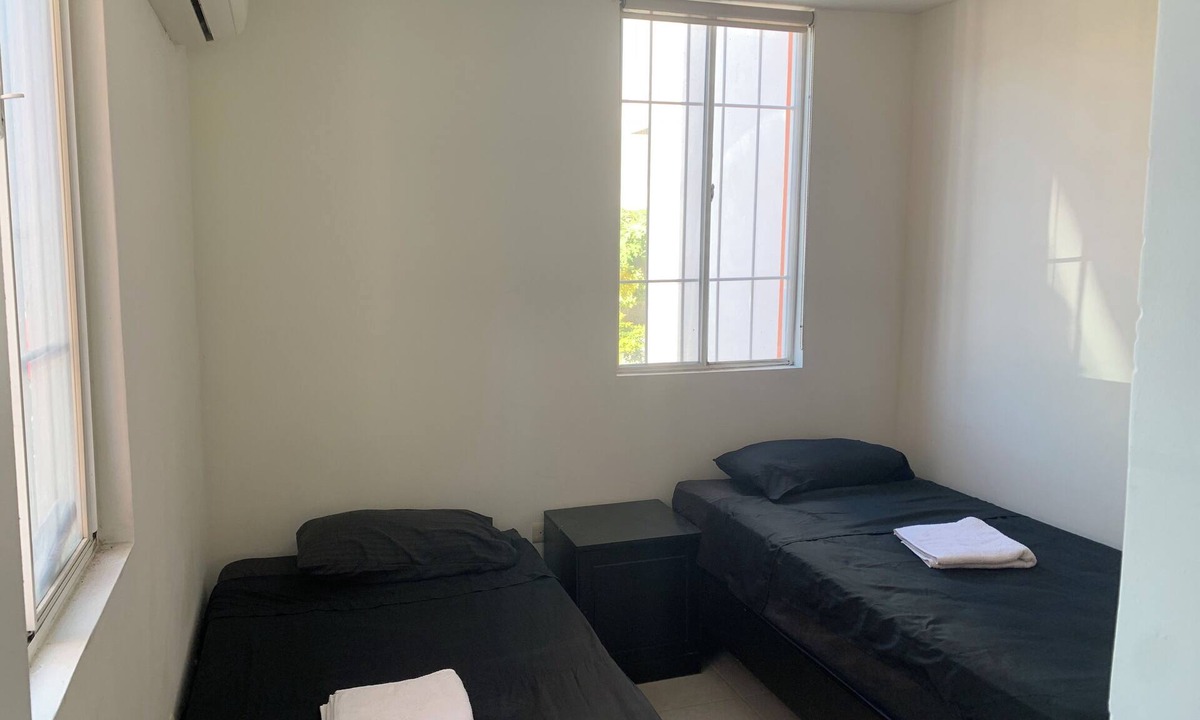 San Nicolas de los Garza House | Comfortable 7 Bed House 15 min from Airport with WI-FI and A/C in Industrial Zone