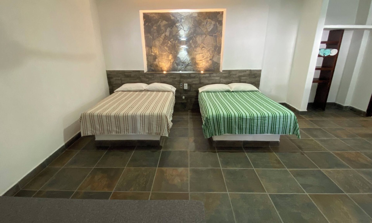 Los Ayala Apartment | Costa Ayala suite 1 with 2 dbl bed and 2 sofas, all basics, 2 blocks from beach