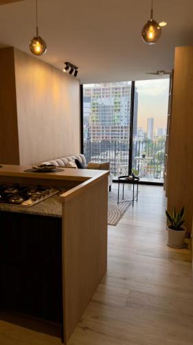 Providencia Apartment | Executive Suite, Rooftop Pool, Workspace IKan HUB