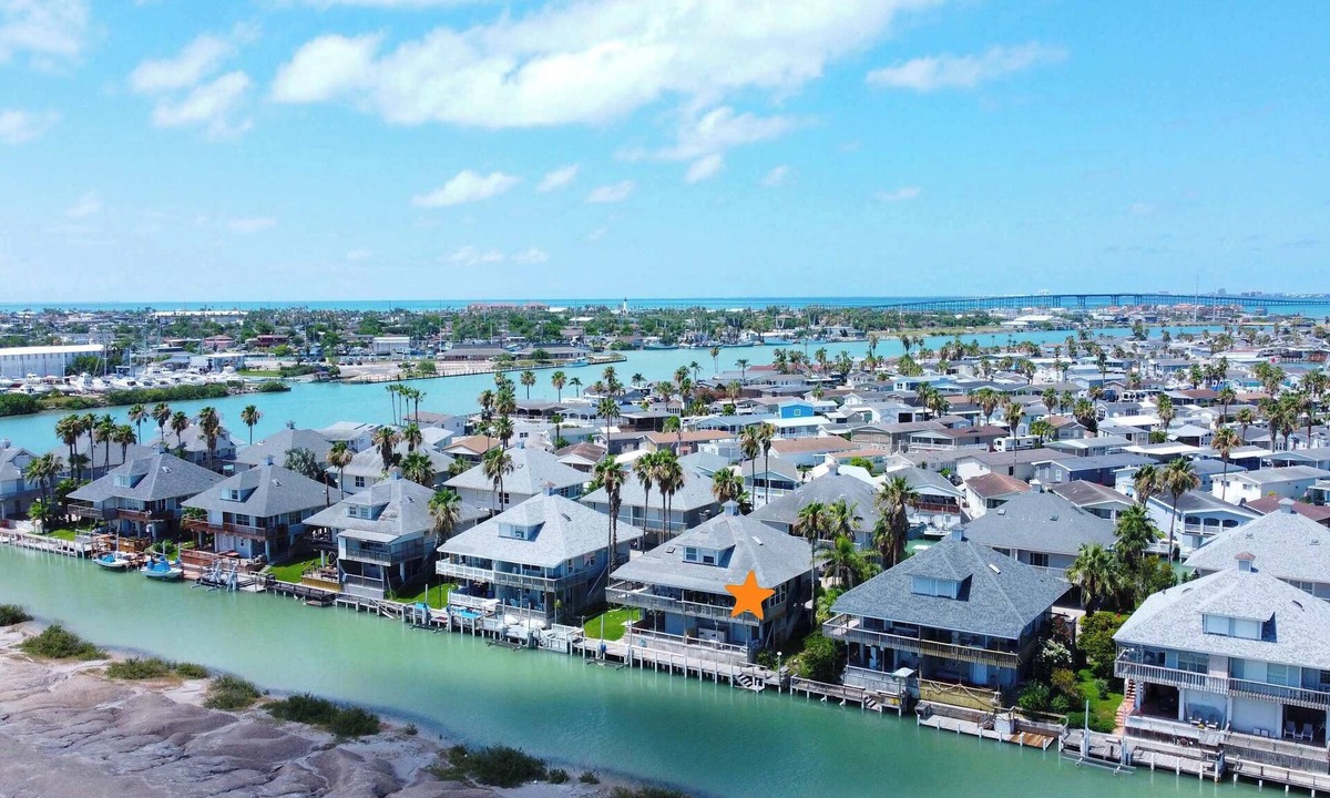 Port Isabel House | Heron by the Sea - Waterfront, Dock, Pools, Golf