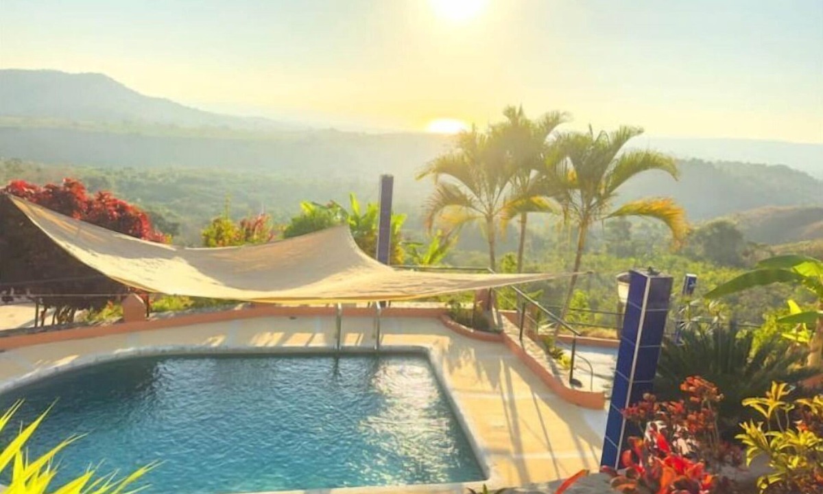 Compostela House | La Casa Chilam - A hidden hillside retreat. Close to beaches and Pet Friendly!