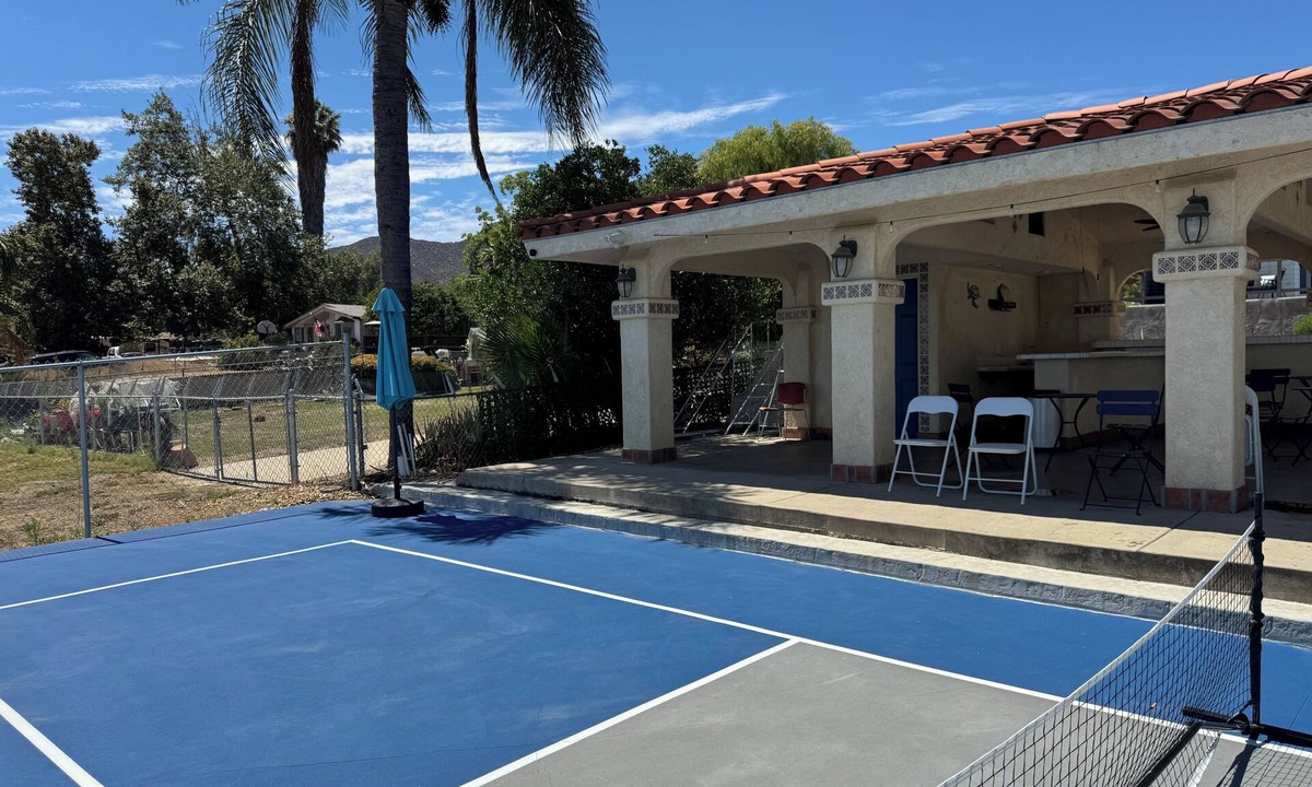 Lakeland Village House | Lakefront Oasis with 2 Private Pickleball Courts, Kayaks, Gazebo, Games & BBQ