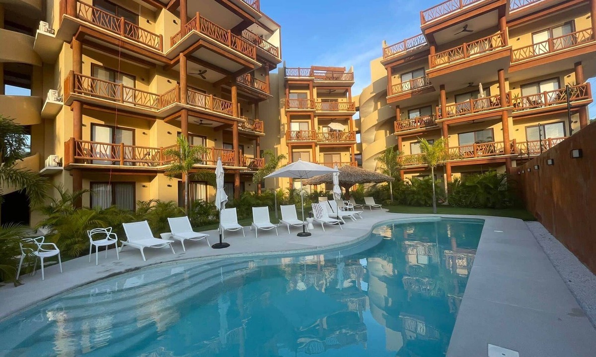 Zihuatanejo Villa | Luxurious 2 bedroom condo Steps from Beach with ocean view from balcony.