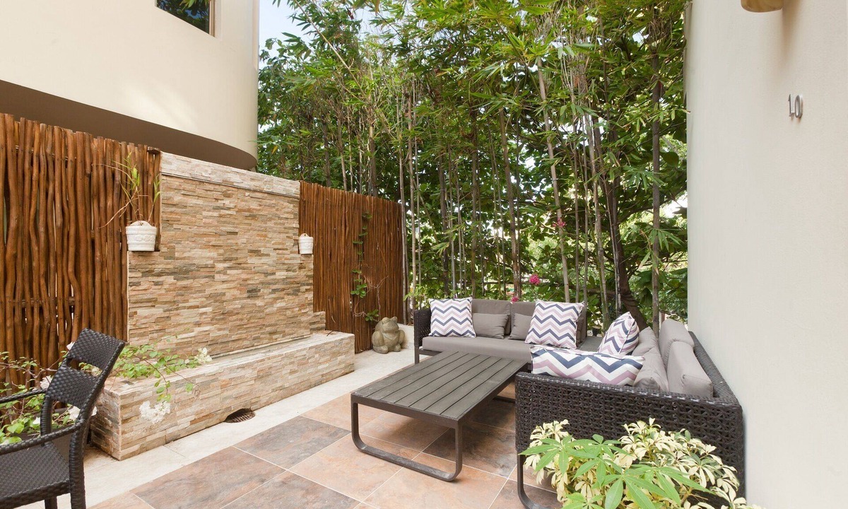 Gonzalo Guerrero Condo | Luxury 1 bed Condo w/ Large Private Patio On 5th Ave. Steps to Beach! Fast Wifi!