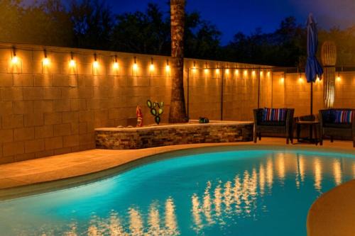 Rancho Vistoso House | Relaxing Summer Nights at Casa Buena Vida Pool Fire Pit Table Games