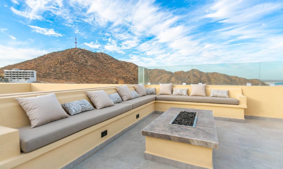 Libertad Condo | This brand-new 2-bedroom, 2-bath condo offers modern comfort with a stylish open layout and fully equipped kitchen. Enjoy a private rooftop terrace with outdoor kitchen and panoramic views—perfect for relaxing and taking in the beauty of Vista Mare.