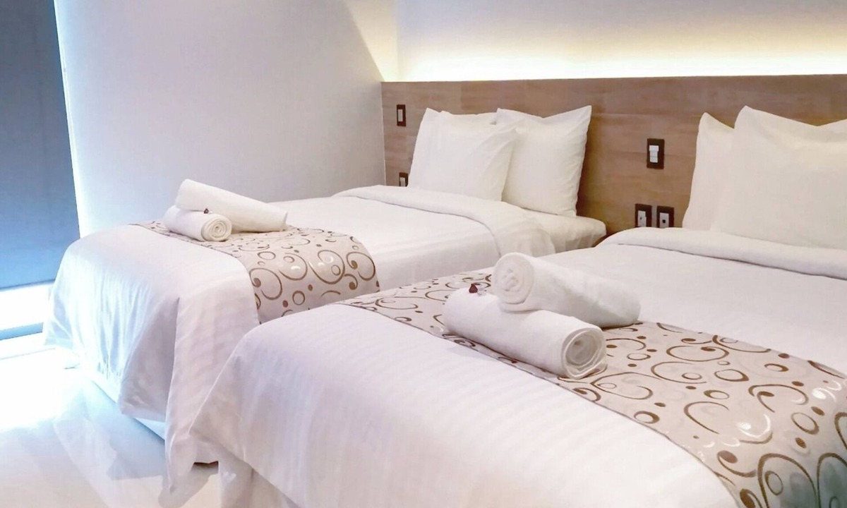 Downtown Cancun Hotel | Three Central Room Perfect for Groups Exploring Cancún’s Hidden Gems