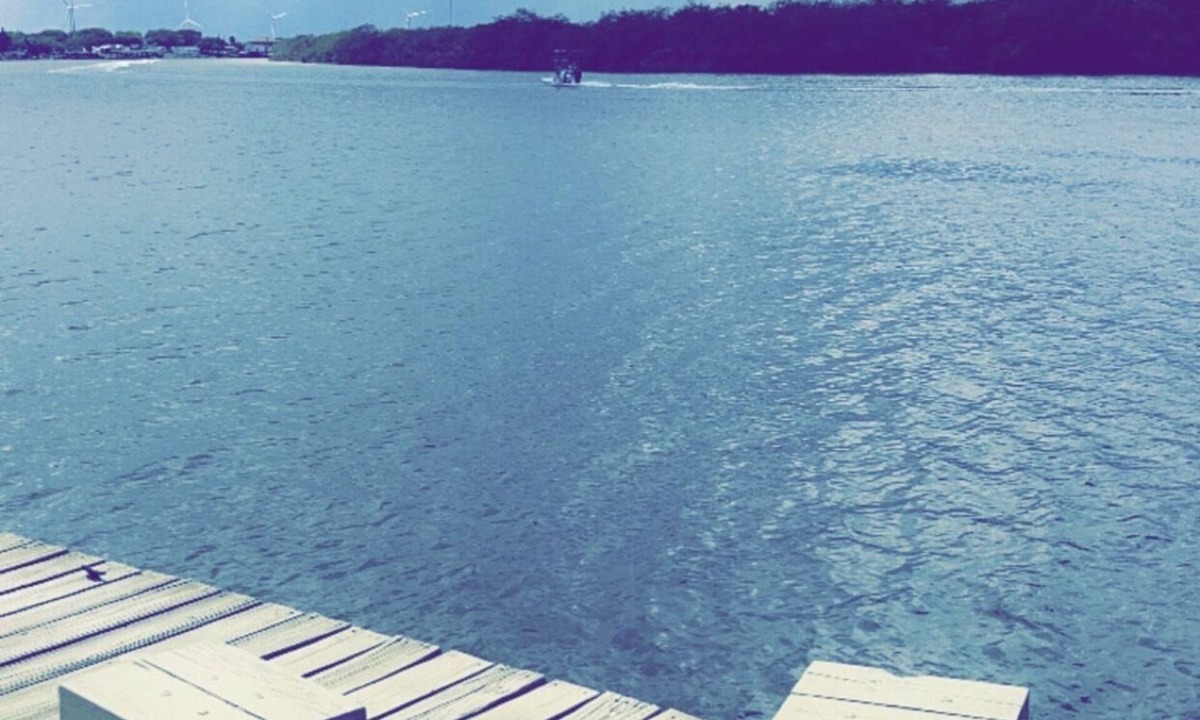 Rio Hondo House | Waterfront 4 bedroom cabin with a great location for fishing in its backyard.