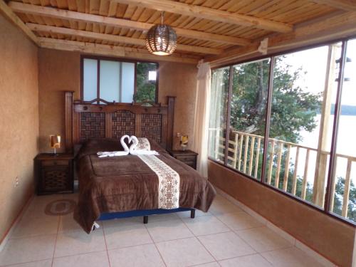 Zirahuen Hotel | ZIRAHUÉN CUIN Habitaciones Rústicas