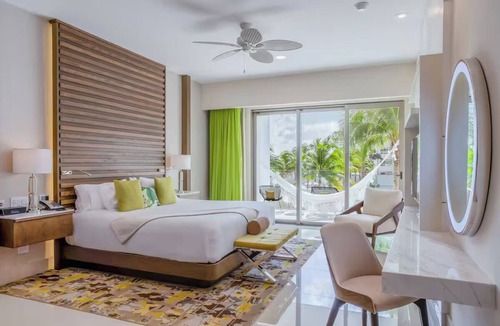 Playa Mujeres Resort | 1 bedroom suite room with king bed