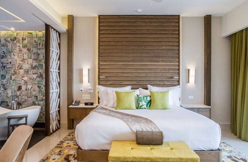 Playa Mujeres Resort | 1 bedroom suite room with king bed