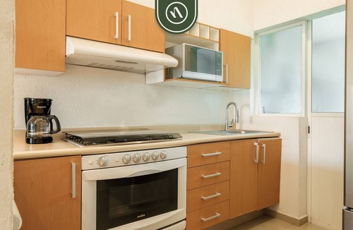 Puerto Marquez Apartment | 2BR Condo in Acapulco with Private Patio - Pool