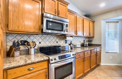 Chandler House | 4BR Oasis: Heated Pool + Games, Central Chandler