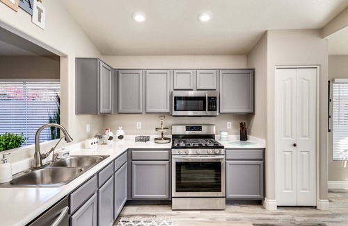 Mesa House | 5 Star Oasis ~ Pool w/Waterfall, Hot Tub, EV Charger & Family Comfort