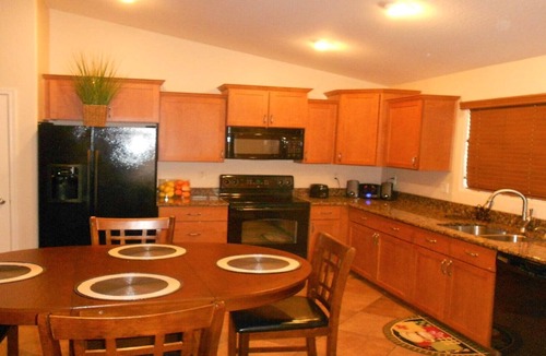 Dove Cove Estates House | 800 SQ FT PUTTING/CHIPPING GREEN NEXT TO HEATED POOL 4 BD RM HOME