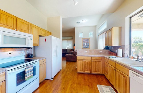 Palm Valley House | Airy home with private heated pool, firepit, grill, enclosed backyard, cornhole