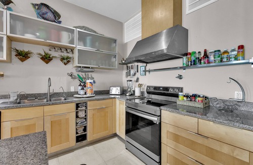 South Padre Island House | Amazing 6 Bedroom Condo Right on the Bay with Private Dock!