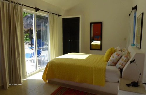 Akumal Villa | Architecturally Distinguished Colorful Casa on Water's Edge