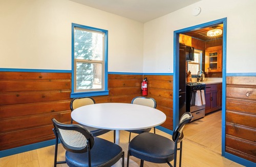 The Village Hotel | Arkouda Cabins: Lazuli Bunting