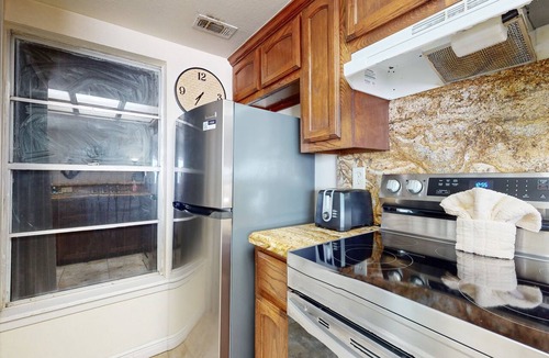 South Padre Island Condo | Bayfront condo close to beach with water views & pool access