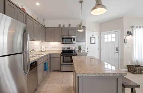 Port Isabel House | Bayfront Home ~close to beach~ Community pool~ hot tub ~ family friendly.