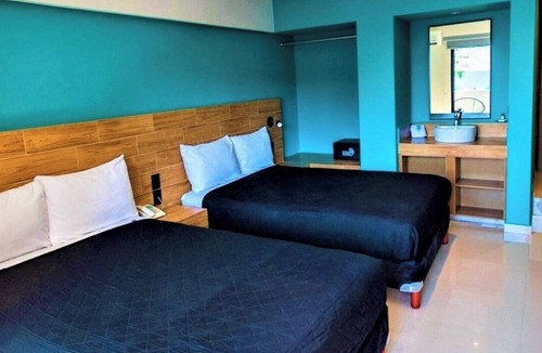 Zona Dorada Hotel | Beachside Comfort Near Camaron Beach with Terrace l 2 Comfortable Rooms