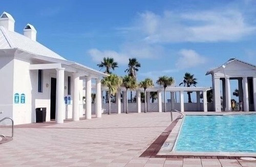 The Shores Condo | beautiful condo on the bay with beach access and a beautiful pool