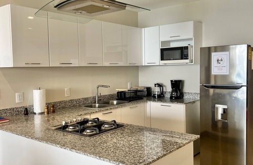 Zona Dorada Apartment | Beautiful condo in Camino al mar, right on the beach for 6 persons
