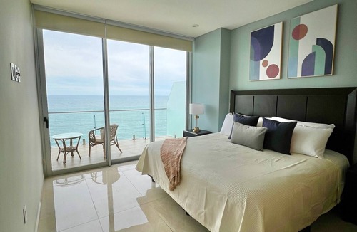 Zona Dorada Apartment | Beautiful condo in Camino al mar, right on the beach for 6 persons