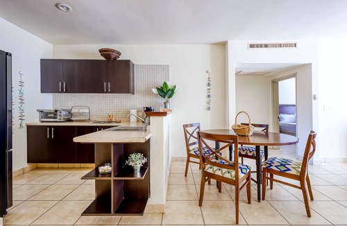 Libertad Apartment | Beautiful condo with a balcony, kitchen, sparkling pools, & fitness center