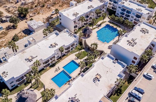 Libertad Apartment | Beautiful condo with a balcony, kitchen, sparkling pools, & fitness center