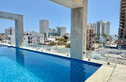 Ferrocarrilera Apartment | Beautiful Loft Steps from the Beach By GPS