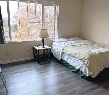 Fontana House | Big bedroom shared bathroom