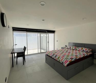 Guadalajara Apartment | Bonito espacio de habitación con terraza, cocina y baño privado en Oasis Malvas - World Cup visitors welcome!