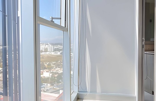 Financial District House | Bright 2BR near Andares w/pool access