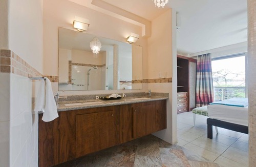 Gonzalo Guerrero Condo | Bright Modern Condo with balcony overlooking 5th Ave. 4 minute walk to the beach