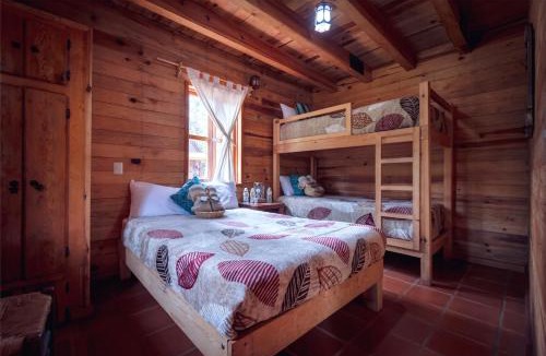 Mascota Ski Chalet | Cabaña Encino para 10 personas en medio del bosque mascotense