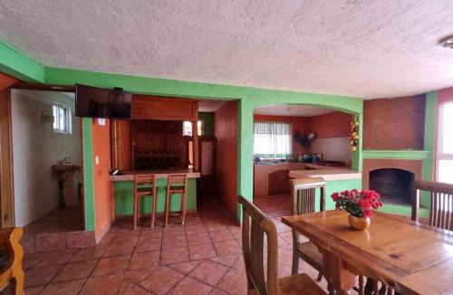 Zirahuen House | Cabañas y Habitaciones El Malecón