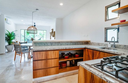 Puerto Aventuras Apartment | Casa Manglar – Modern Comfort with Golf Course Views