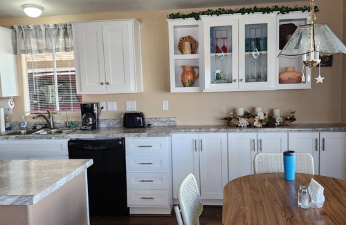 East Mesa House | Charming 2-bedroom 2 bath house with AC in a gated 55 and over community in Mesa