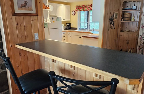 Big Arm House | Charming Lake Front Home with Deck, Dock, Beach and Spectacular Views