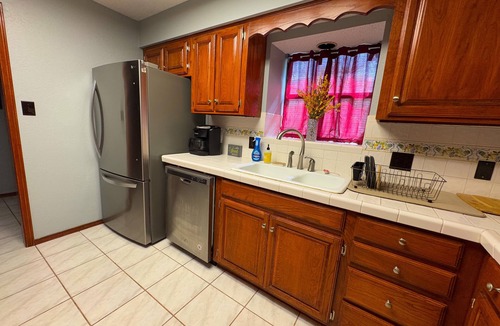 Weslaco House | Charming Pet-Friendly Home near Progreso w Grill, Smart TVs, and Fenced Yard
