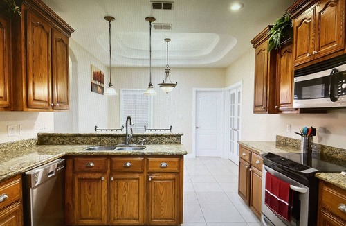 McAllen Villa | Cheerful 4 BR place with pool, game room and after pool rest area