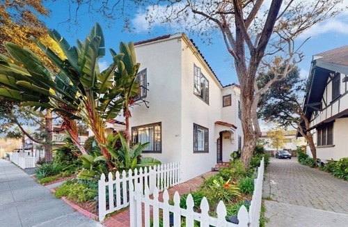 East Beach Apartment | Classic beach suite 1 block to ocean - fireplace, lovely patio, near downtown