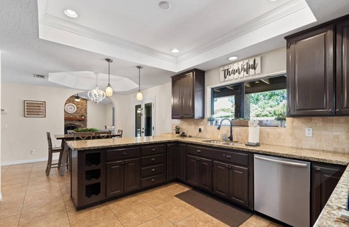 Estate Grove Valencia Est House | Cool Off at This 5BR Mesa Home | Pool, Hot Tub, Putting Green, Playground & Covered Outdoor Bar